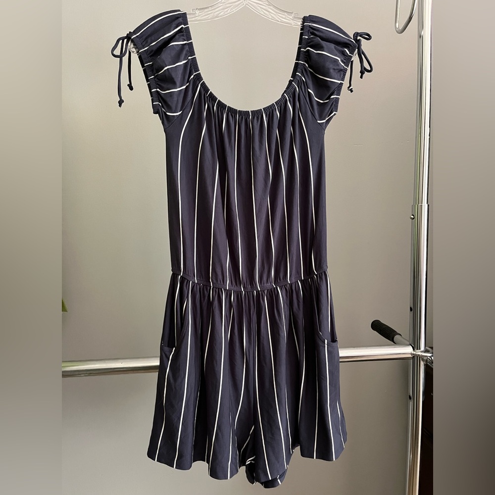 Express one piece shorts outfit. Navy with white stripes. Comfy and soft!